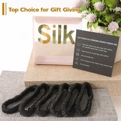 LOVUITEN scrunchie on bedside table illustrating gentle night hair care
