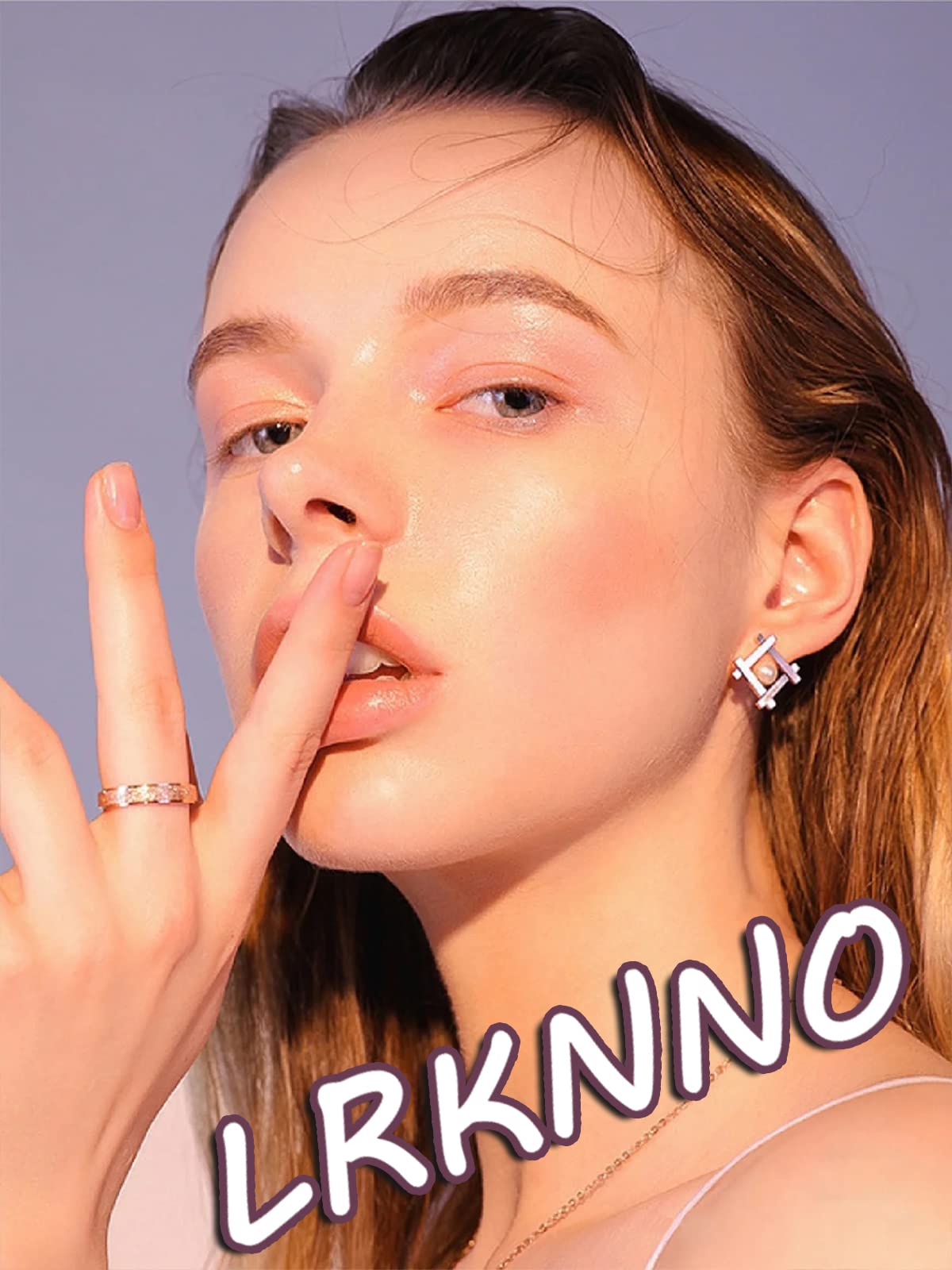 LRKNNO nails shown next to ruler to demonstrate short almond length