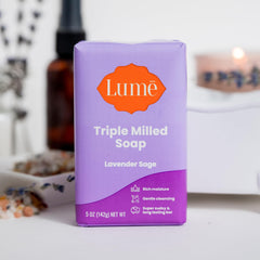 Lume soap resting on draining dish to prolong bar lifespan