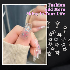 Lusofie manicure featuring star charms showing eye-catching Y2K aesthetic benefit