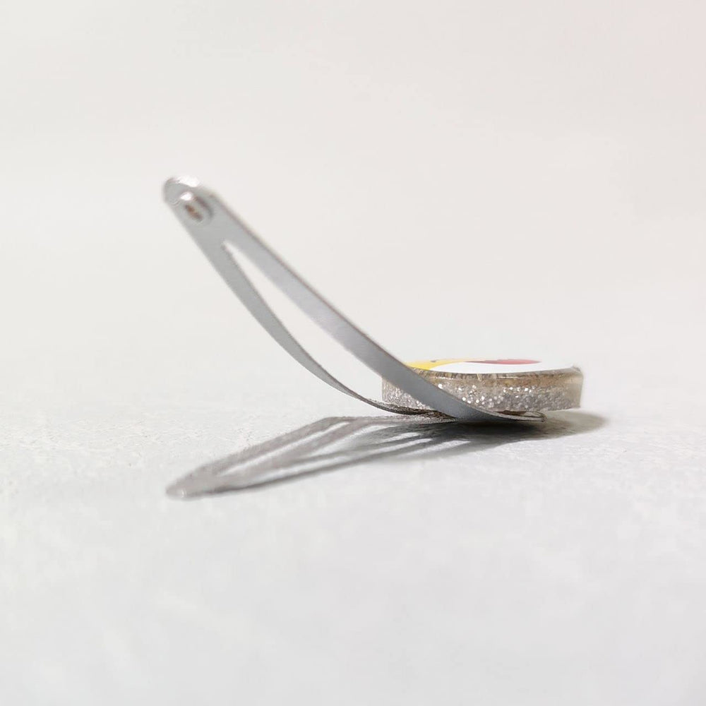 LUV HER clip beside a coin showing scale for accurate size and lightweight wear