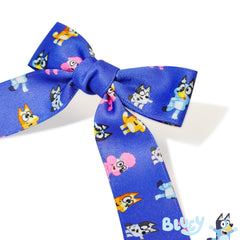 LUV HER child wearing bow in ponytail demonstrating comfortable all-day hold