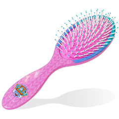 Luv Her brush in use with child demonstrating gentle detangling benefit