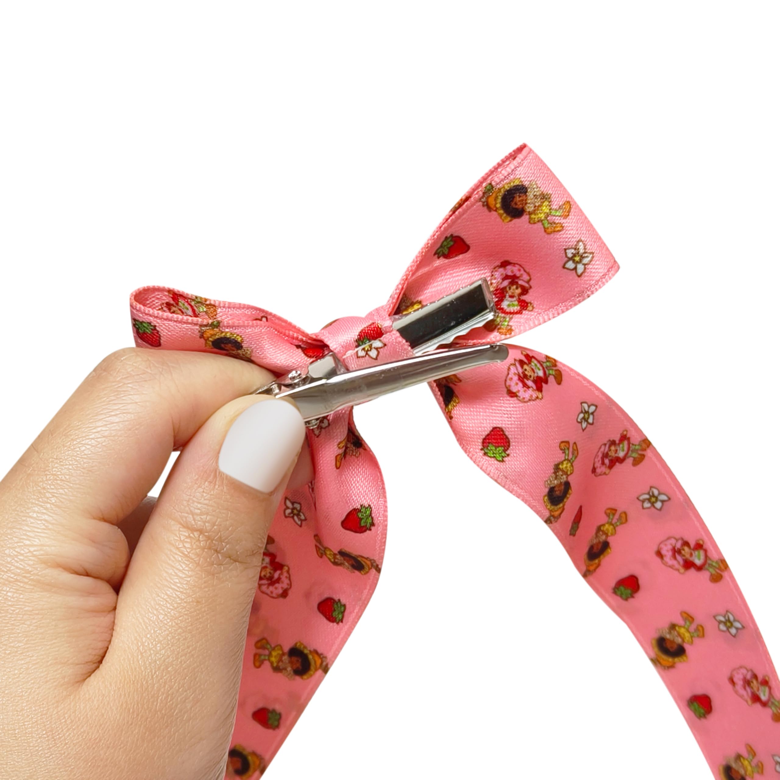 Child wearing LUV HER bow outdoors demonstrating cute style and everyday durability