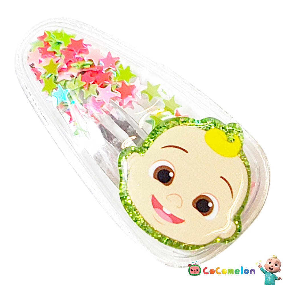 LUV HER Cocomelon clip next to coin showing compact size and scale