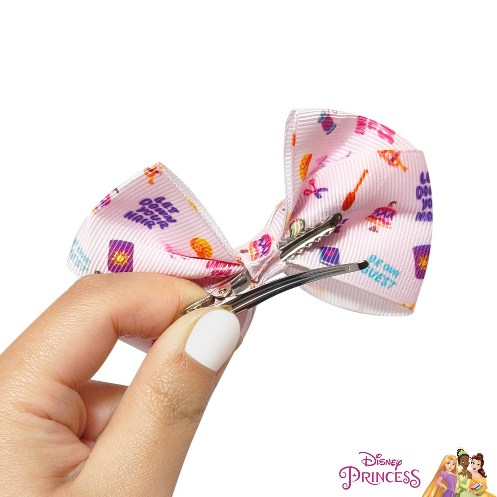 LUV HER clip in child’s hand showing 4-inch size for styling reference