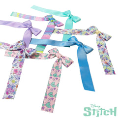 LUV HER child wearing a bow outdoors highlighting playful charm and durability