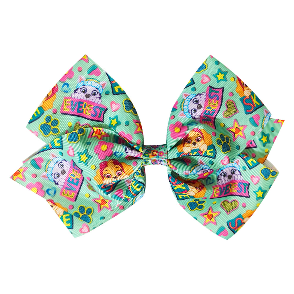LUV HER bow next to a ruler showing size and scale for gifting