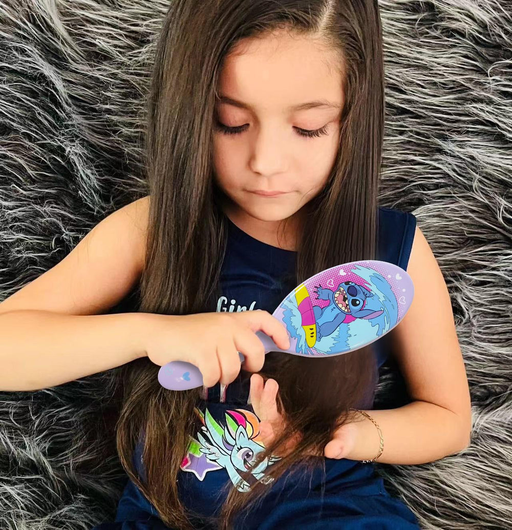 LUV HER brush rounded bristles and cushion close-up for gentle detangling
