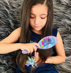 LUV HER brush rounded bristles and cushion close-up for gentle detangling
