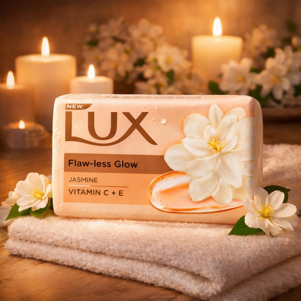 LUX soap bar in hand showing 150g scale and easy grip