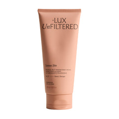 Lux Unfiltered front bottle showing product and branding, highlights natural glow