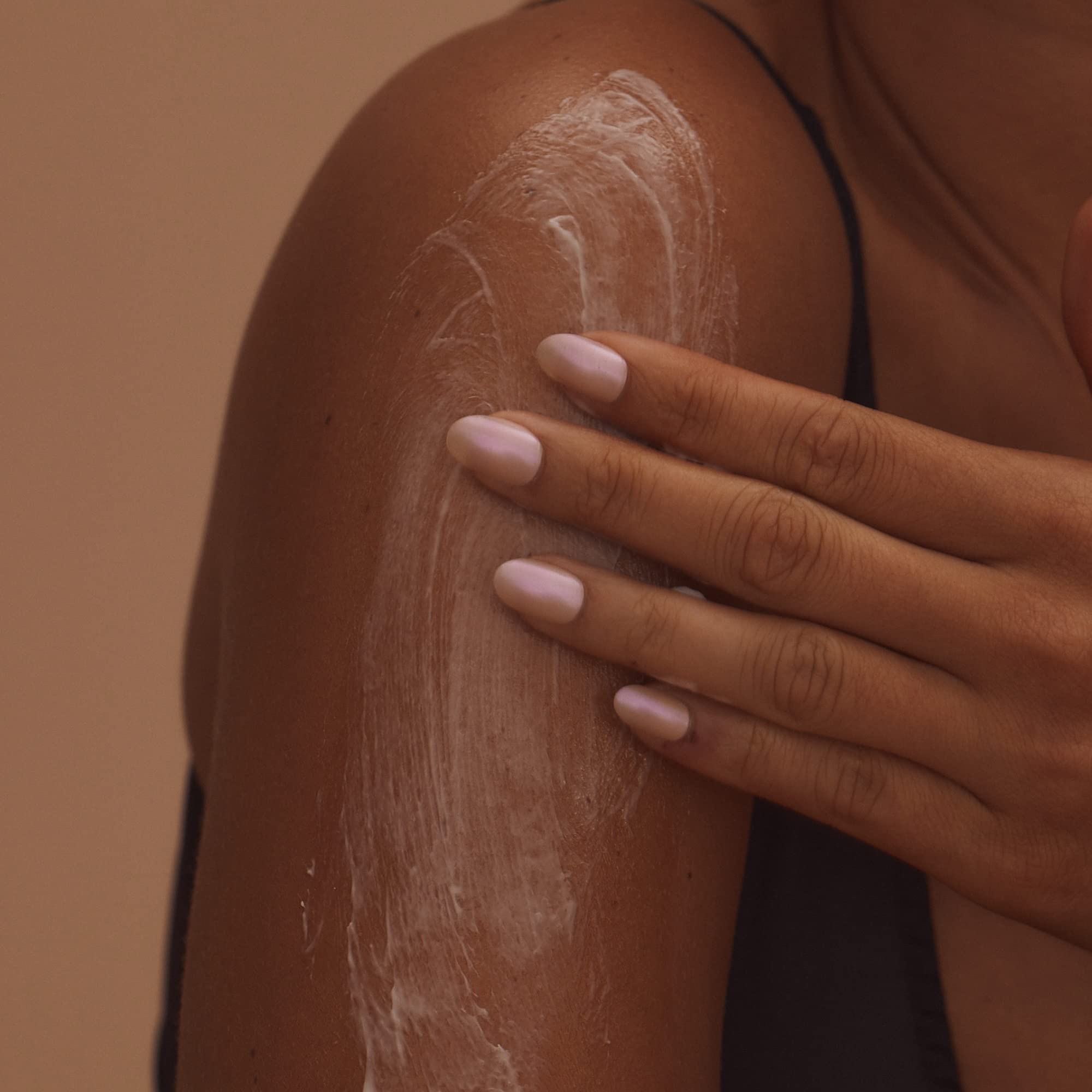 Lux Unfiltered applied to forearm illustrating visible hydration benefit