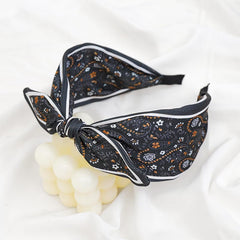 Lvyeer headband worn by girl in casual outfit demonstrating gentle fit