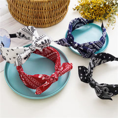Lvyeer headband worn with ponytail showing decorative bow and effortless styling benefit