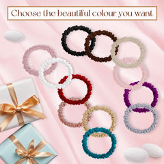 Lwoeo scrunchie held in hand for scale showing slim profile and comfortable size