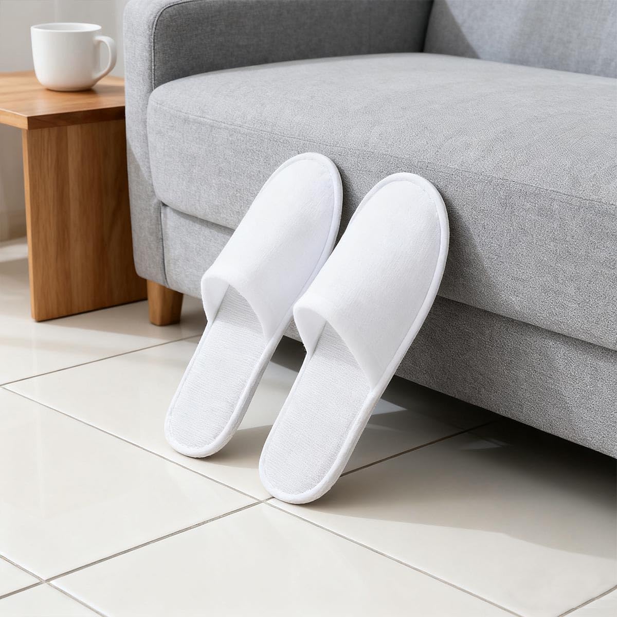 LYARCHTE slipper beside hand for size comparison showing fit guidance