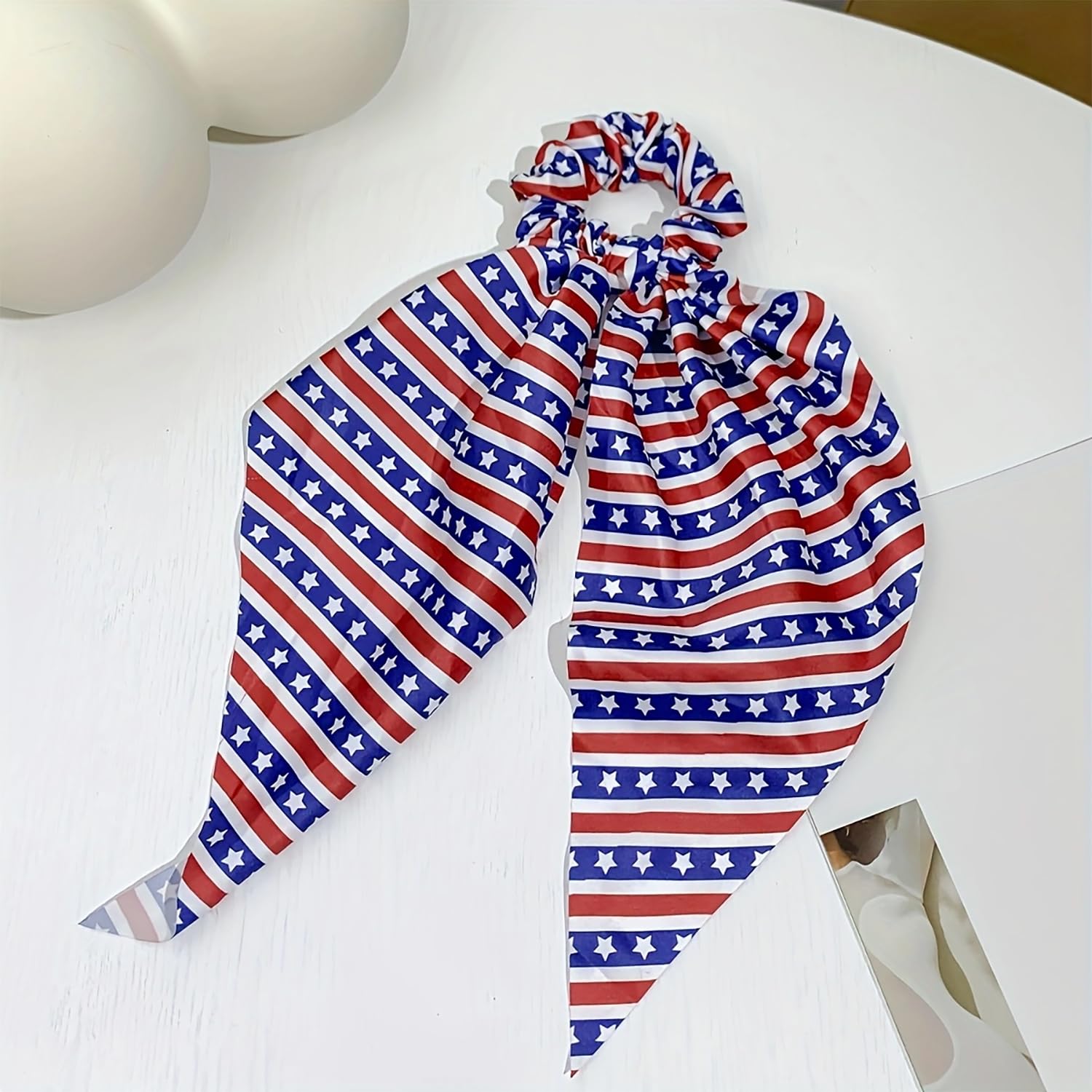 LYLYNB detail of removable knotted bow showing two-in-one versatility