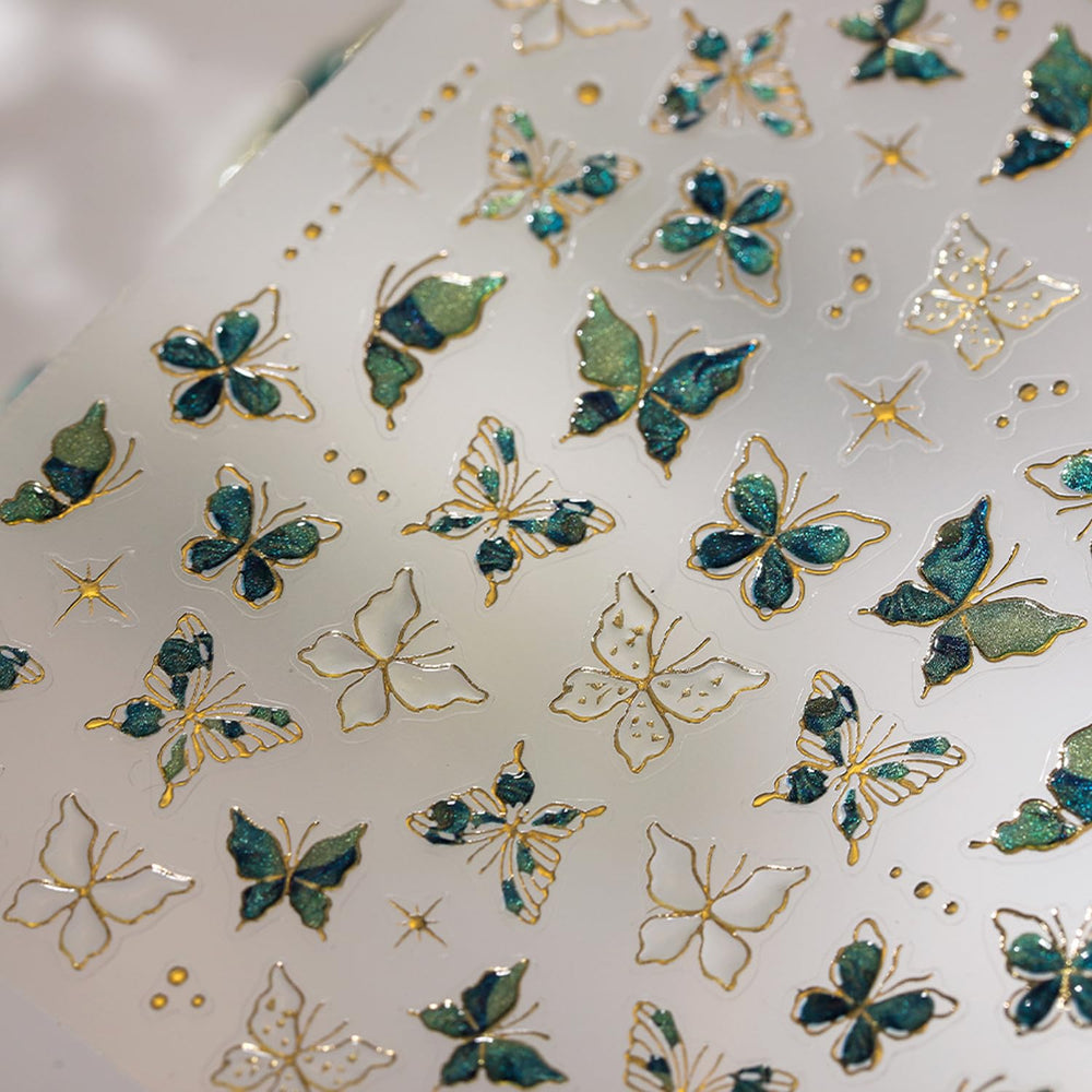 LYLYNB finished manicure lifestyle shot showing butterflies for elegant everyday wear