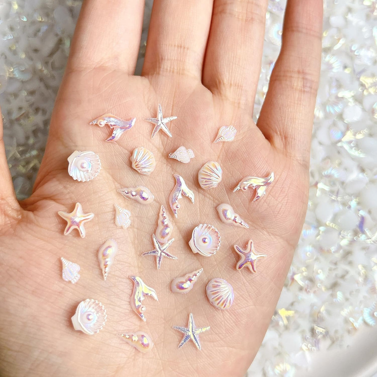 LYLYNB front packaging showing 50-piece seashell nail charms and benefits