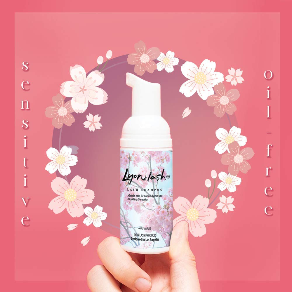 Lyon Lash bottle in hand for scale showing compact 60ml travel convenience