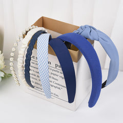 LYroo pearl-accent headband close-up highlighting decorative pearls for elegant looks