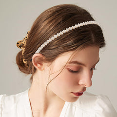 LYroo pearl detail close-up showing decorative finish for dressy looks