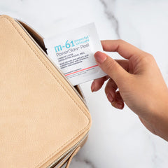 m-61 pad applying to cheek demonstrating easy one-minute exfoliation