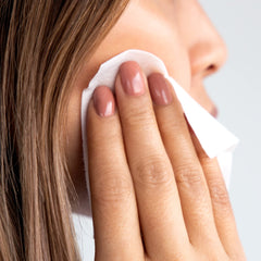 m-61 poweglow pad in hand demonstrating one-minute application for refreshed skin