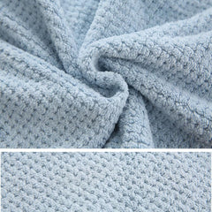 M-bestl towel next to ruler to show size and fit advantage