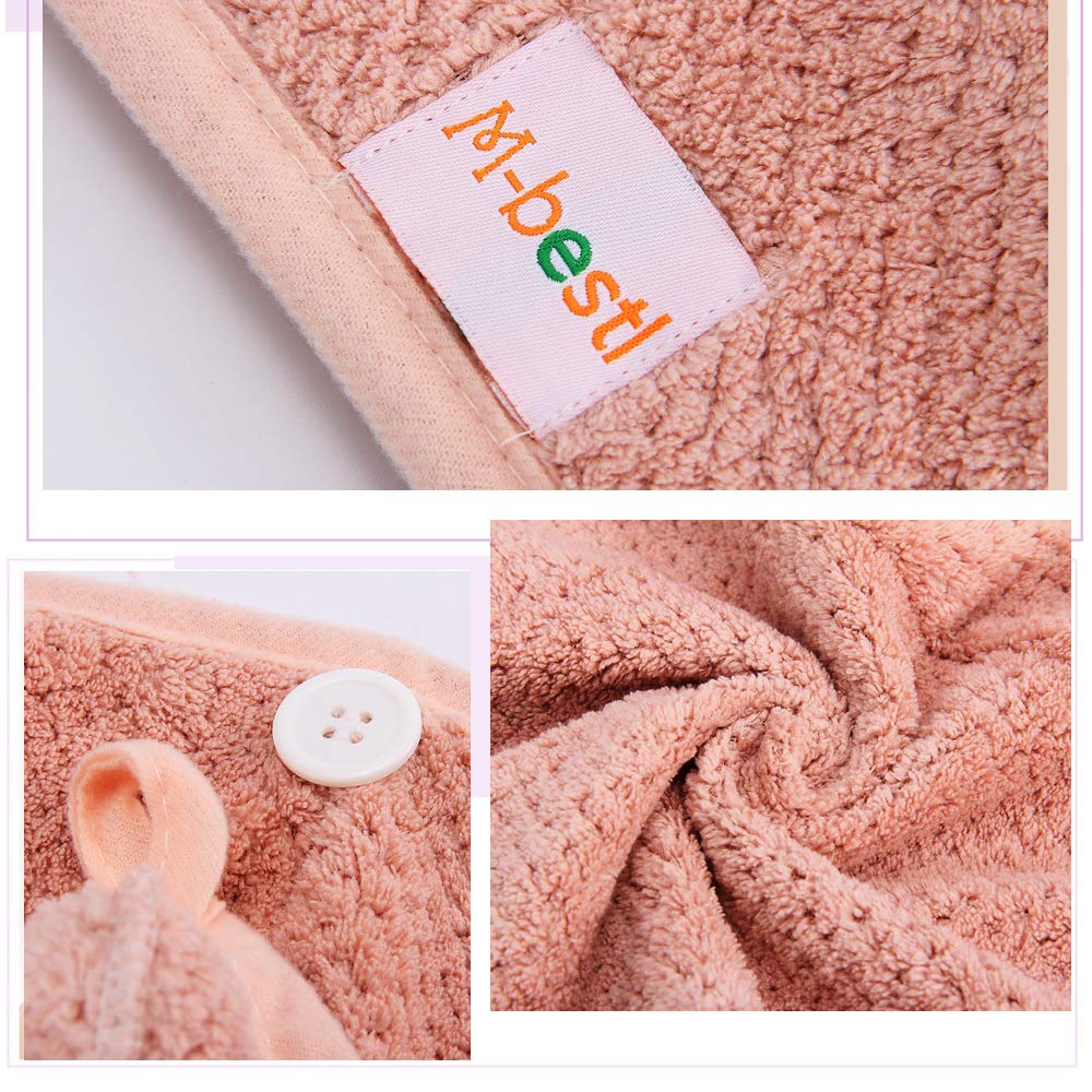 M-bestl towel next to a hand for scale showing generous length for long hair