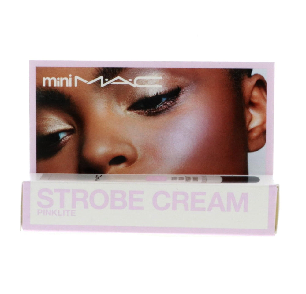 M.A.C Pinklite mini held next to a coin for scale, highlights portable 0.5 fl oz convenience