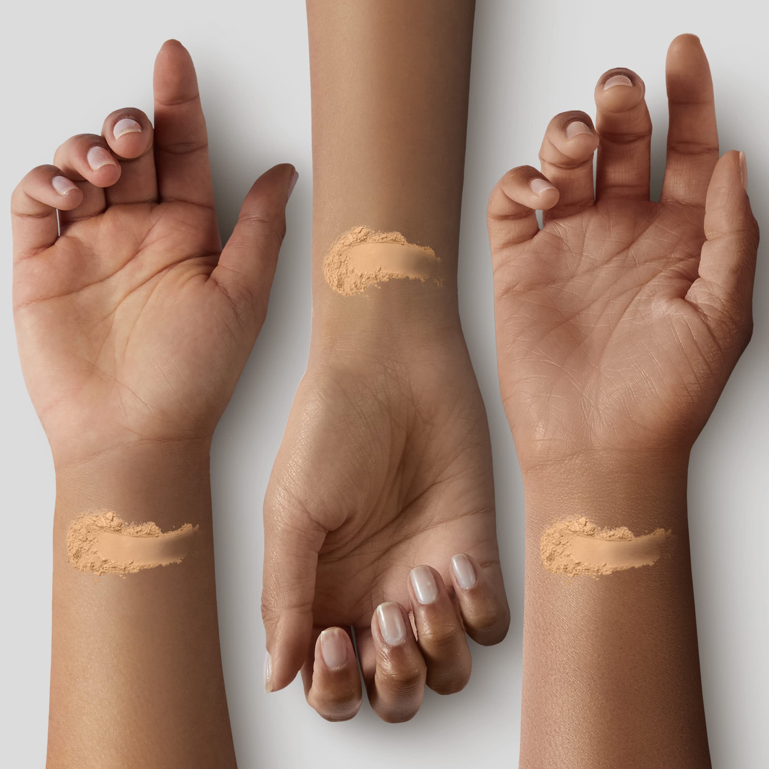 MAC Studio Fix compact held in hand demonstrating portable size and on-the-go touch-up benefit