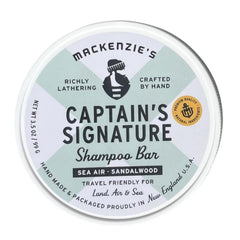 MACKENZIE'S front packaging showing compact travel-ready puck and bar benefit: easy packing