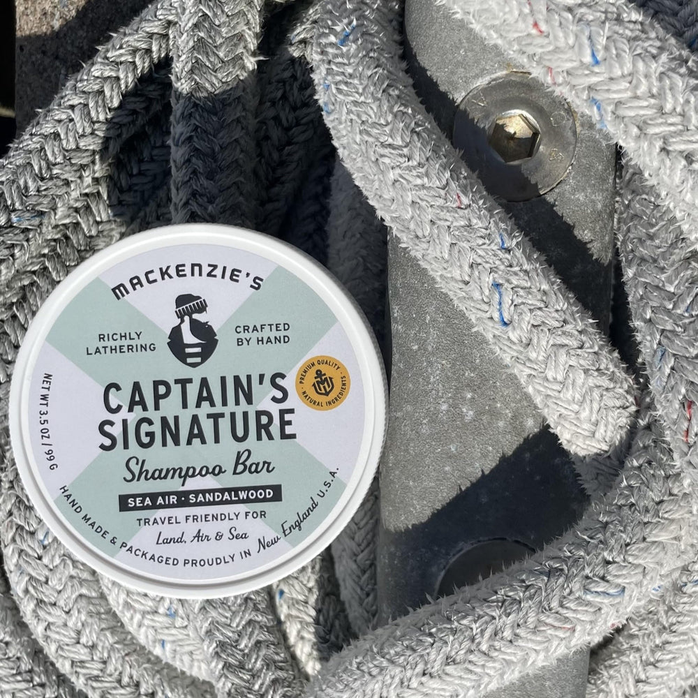 MACKENZIE'S lifestyle image on beach with fisherman showing outdoor-ready freshness benefit