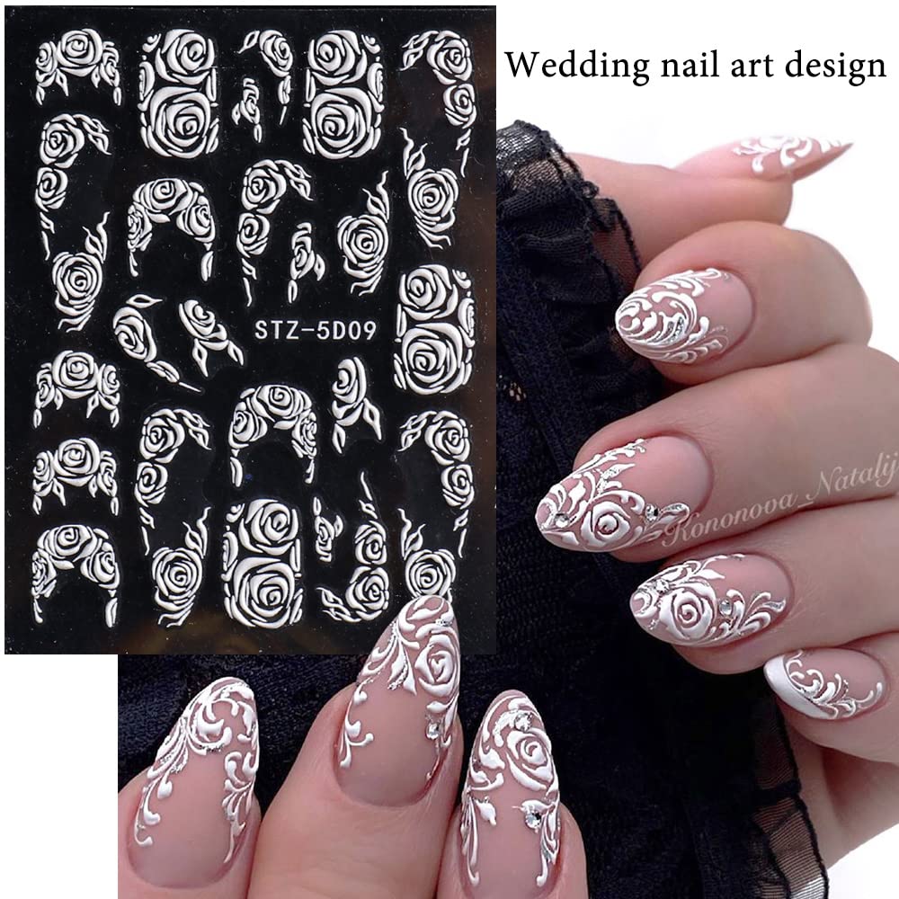 Macute floral decals applied on natural nails creating a bridal elegant finish