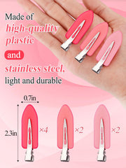 MADHOLLY clip shown in hand for scale, compact travel-friendly size