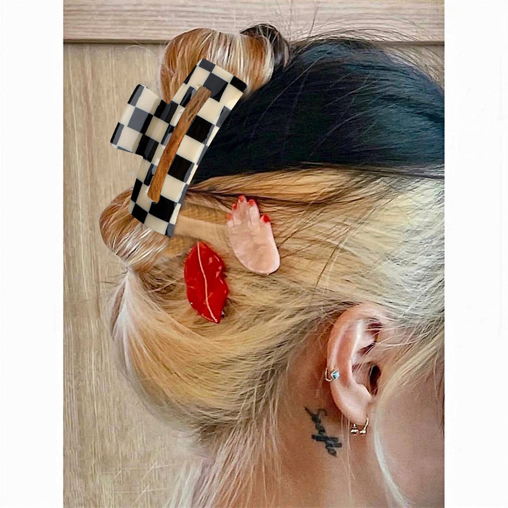 Magicsky clip used while applying makeup to keep hair clean and out of face