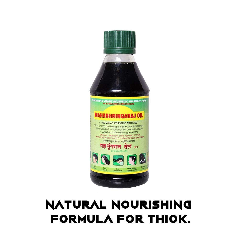 Mahabhringaraj Oil pouring texture close-up highlighting smooth application