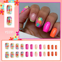 Maigitur close-up of floral French-tip detail highlighting colorful spring design