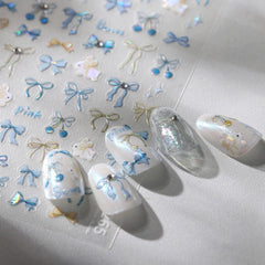 Maigitur front sheet showing blue bow nail stickers and motifs, easy selection benefit