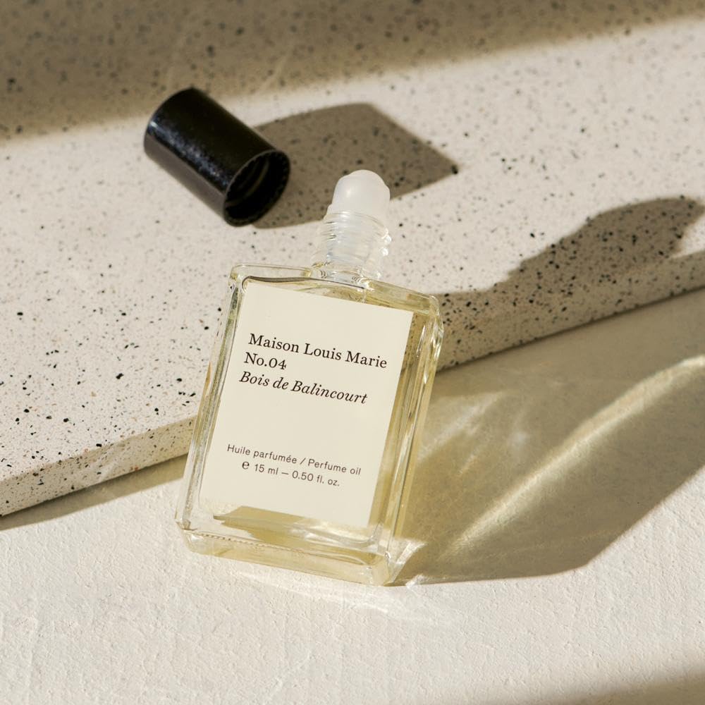 Maison Louis Marie label close-up showing fragrance name and clean-beauty benefit
