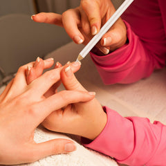 Maitys before and after French manicure showing longer-looking nails