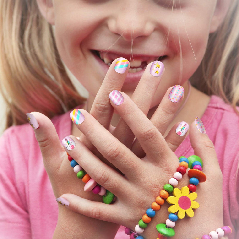Maitys lifestyle shot of a girl wearing nails enjoying a party-ready look