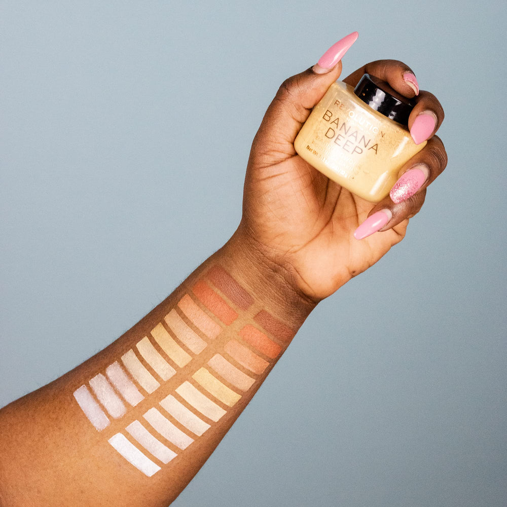 Makeup Revolution on vanity styled scene showing product use and everyday glow