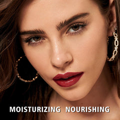 MAKI YIKA texture swipe on skin showing glossy oxblood finish benefit: visible color payoff