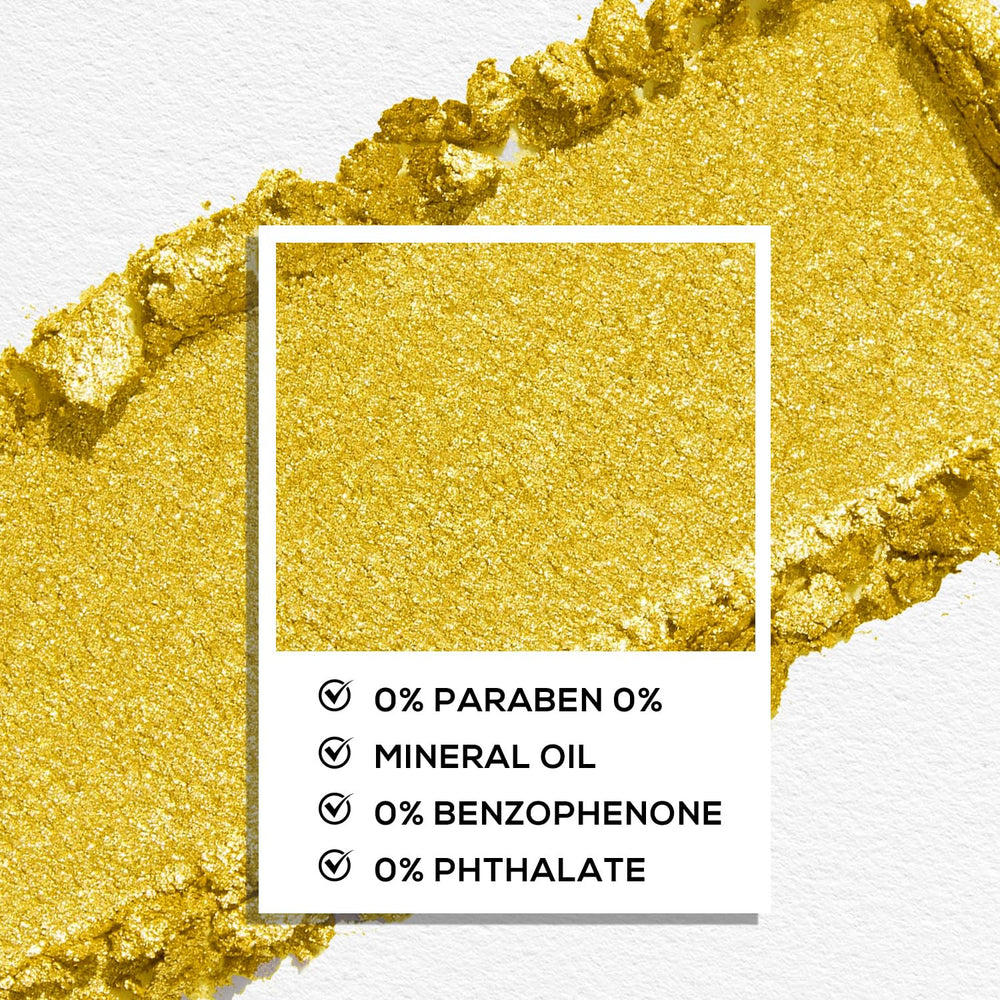 MAKI YIKA swatch on arm with intense gold pigment and true color payoff