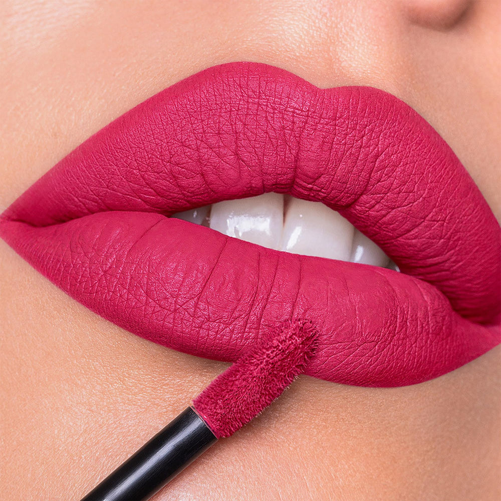 MAKI YIKA applied on model lips highlighting long-lasting vibrant finish