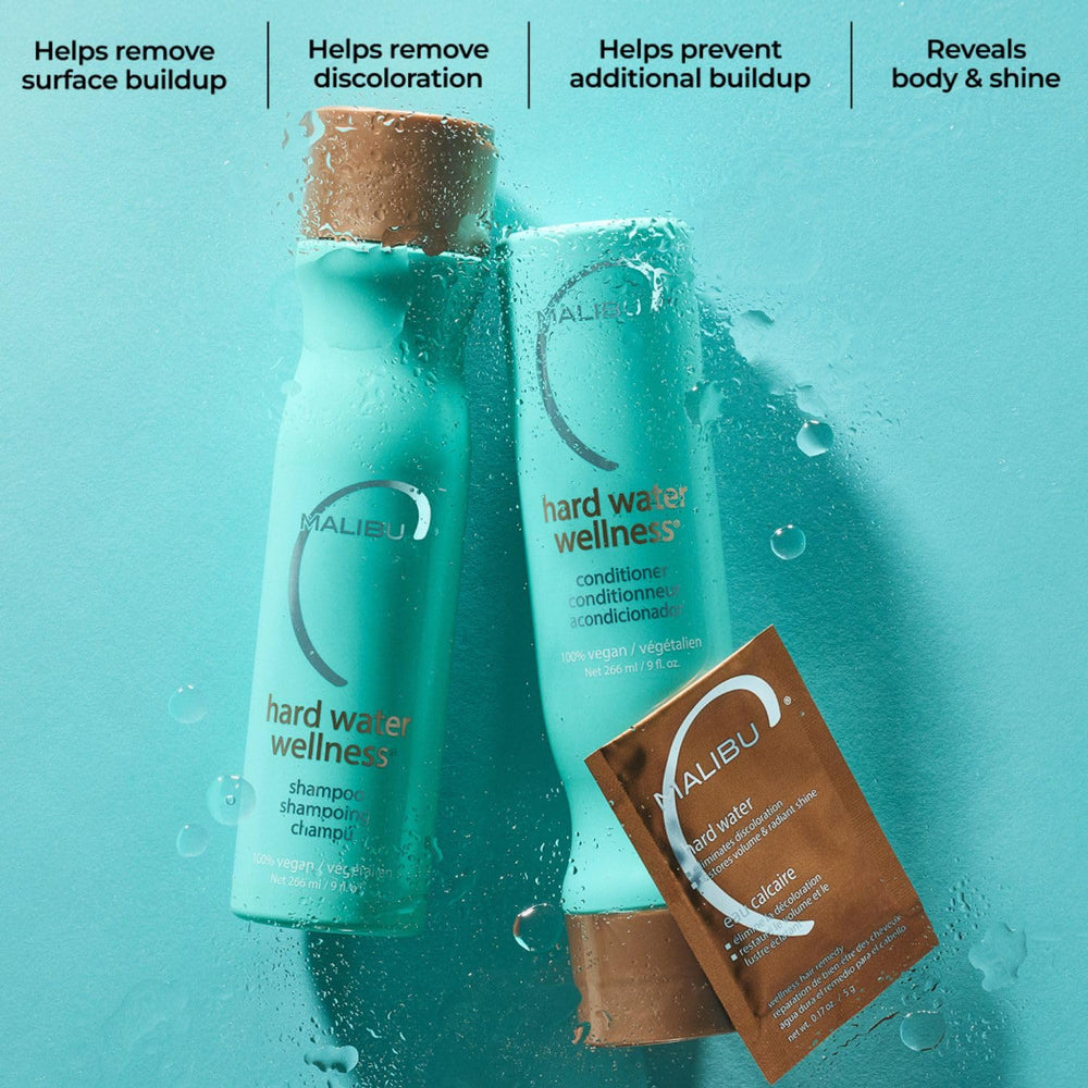 Malibu C single-use packets held in hand conveying easy, travel-friendly dosing