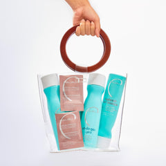 Malibu C bottle on bathroom shelf suggesting daily travel and convenience
